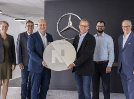 Symbolisch Coil-Übergabe Mercedes-Benz AG und Nexigen®